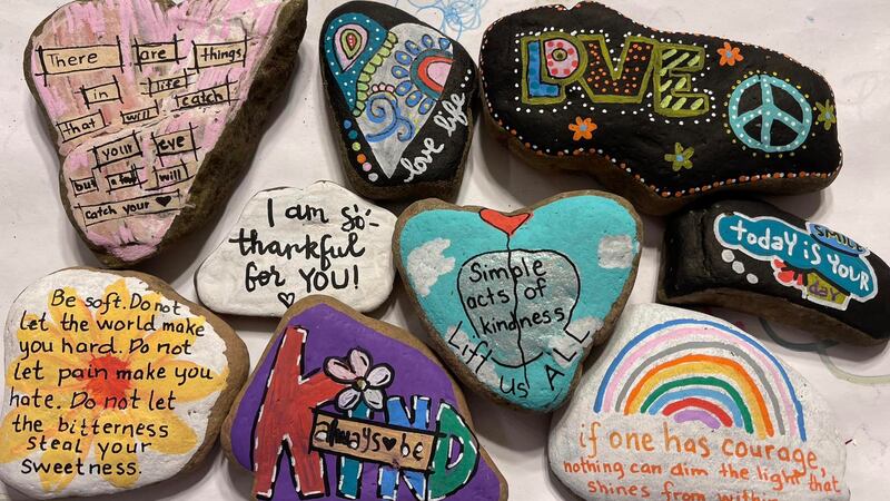 Some of the rocks are painted with popular characters and some are painted with complex...