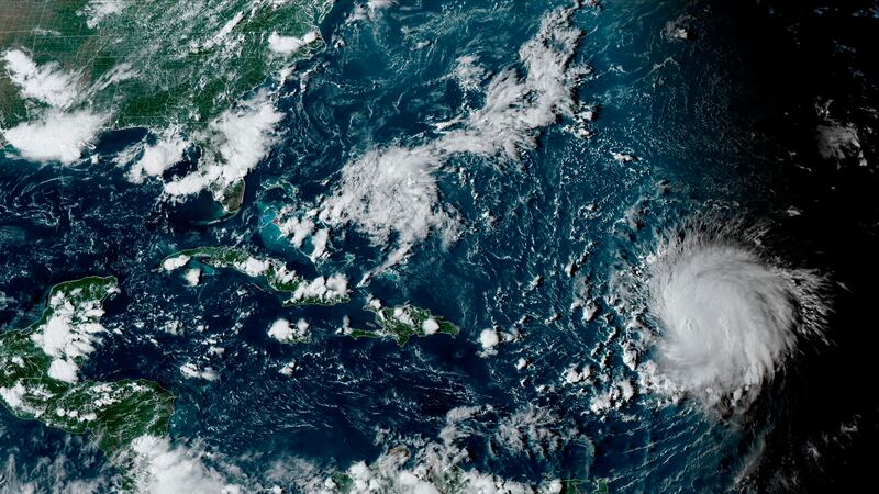 This satellite image provided by the National Oceanographic and Atmospheric Administration...