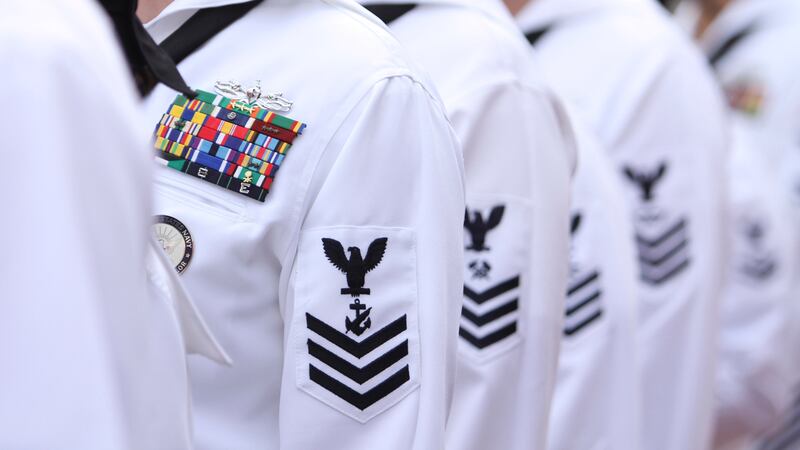FILE - Enlisted sailors line up and wait to march on the field at Sun Life Stadium before the...