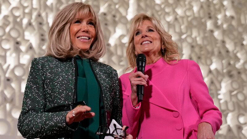 First lady Jill Biden and French President Emmanuel Macron's wife, Brigitte Macron, visit...