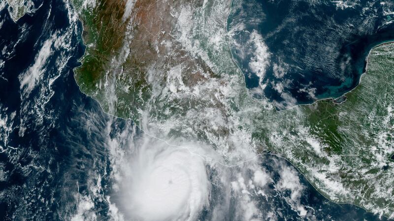 This satellite image provided by NOAA on Tuesday, Oct. 24, 2023, shows Hurricane Otis...