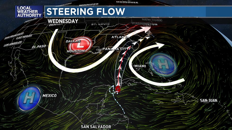 The trough deepens to the west and pushes Idalia to the northeast around a Western Atlantic...