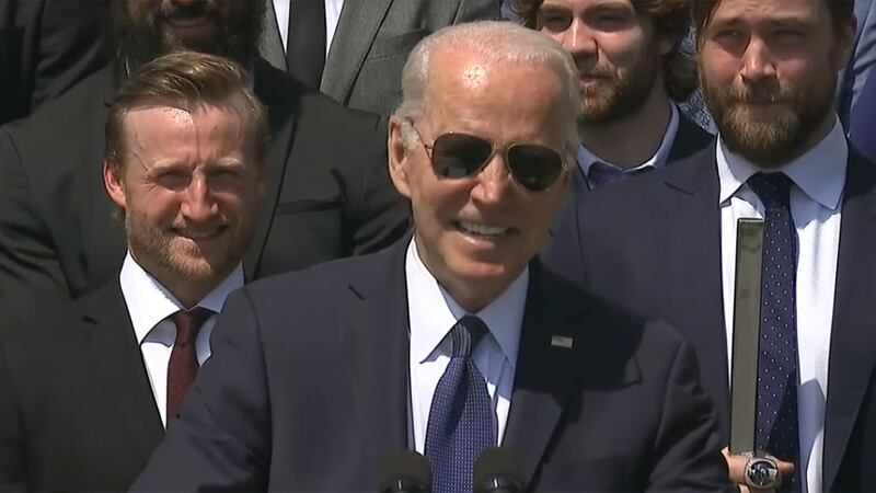 President Joe Biden wonders "what's in the water down there" as he salutes on Monday the Tampa...